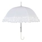 Elegant white wedding umbrella with frilled edge for outdoor ceremonies.