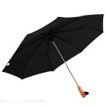 Black Duckhead umbrella with wooden handle for rain protection.